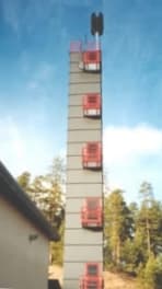 Nummelan paloaseman monitoimitorni — punainen harjoitusrakennelma ja letkunkuivaustorni